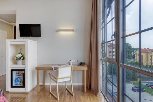 Habitación Triple del hotel ITALIANA HOTELS MILAN RHO FAIR. Foto 2