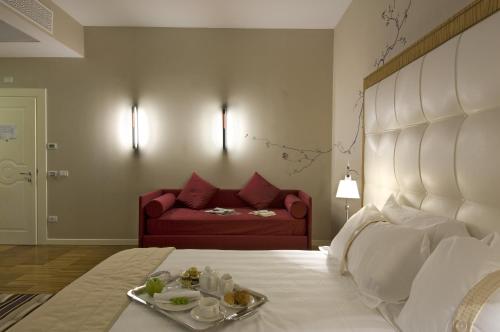 Habitación Triple del hotel ITALIANA HOTELS MILAN RHO FAIR. Foto 3