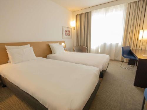 Habitación Doble Superior - 2 camas del hotel Novotel Salerno Est Arechi. Foto 1