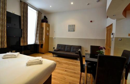 Estudio Sofá Cama incluido 1 Cama doble kitchenette del hotel Hyde Park Apartments. Foto 1