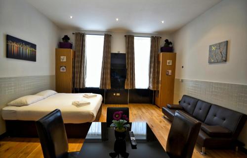 Estudio Sofá Cama incluido 1 Cama doble kitchenette del hotel Hyde Park Apartments. Foto 4