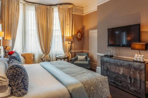 Habitación Deluxe - 1 cama extragrande - Cadogan Gardens, 11 del hotel 11 Cadogan Gardens, The Apartments and The Chelsea Townhouse by Iconic Luxury Hotels. Foto 2