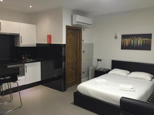 Estudio 1 Cama Individual 1 Cama doble kitchenette del hotel Paddington Apartments. Foto 2