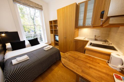 Estudio Estándar con balcón del hotel Studios2let Bloomsbury. Foto 10