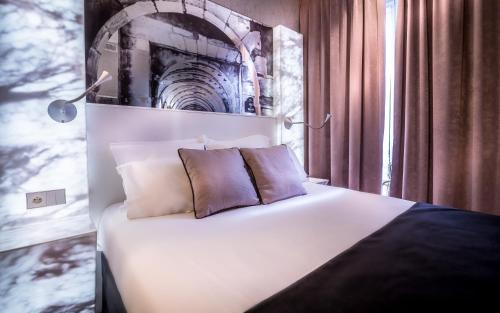 Habitación Doble Clásica del hotel Hôtel Marais Grands Boulevards. Foto 1
