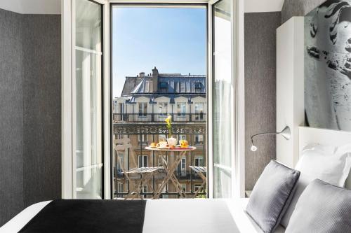 Habitación Doble Clásica con balcón - 2 camas del hotel Hôtel Marais Grands Boulevards