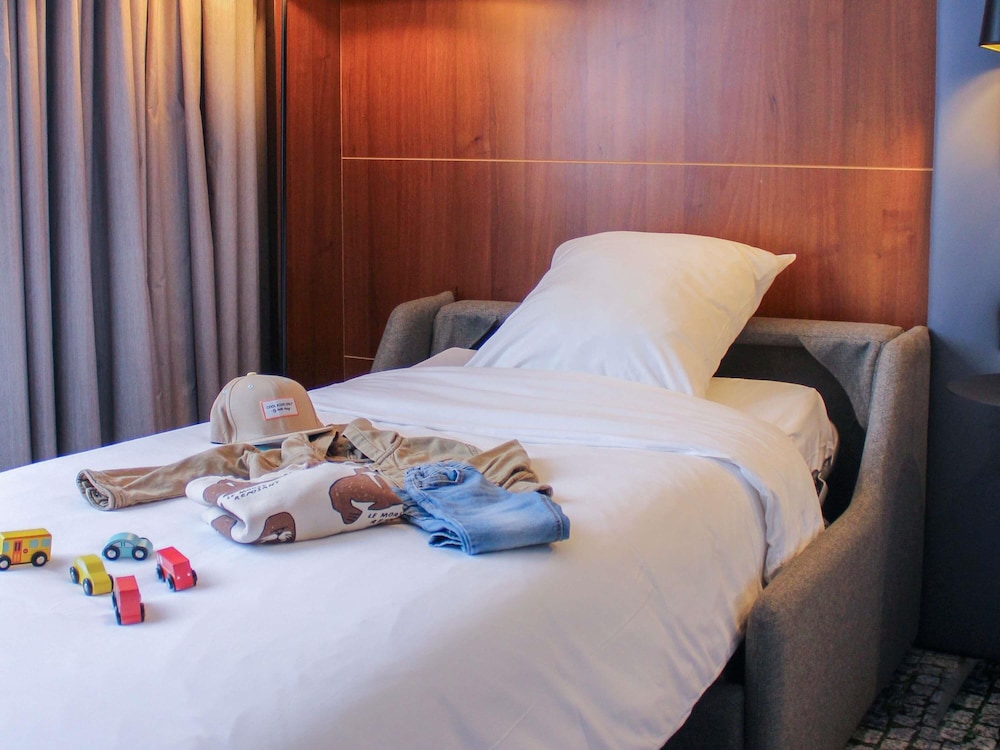 Habitación familiar (1 Double Bed and 1 Single Bed) del hotel Mercure Toulouse Centre Compans. Foto 2