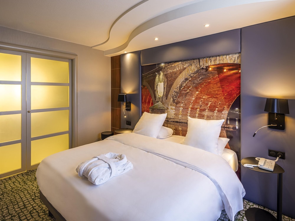 Suite superior, 1 cama doble con sofá cama del hotel Mercure Toulouse Centre Compans. Foto 1