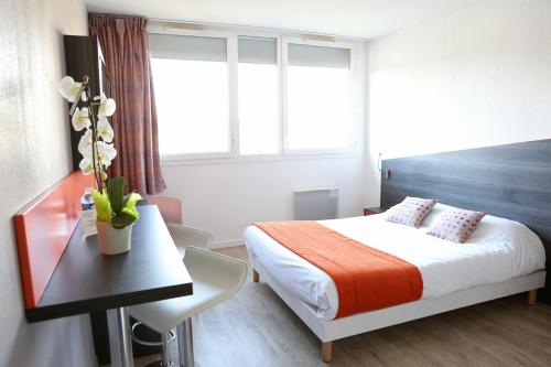 Estudio Doble del hotel Adonis Paris Sud. Foto 6