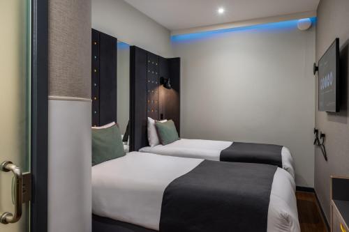 Habitación Doble Cosy sin ventana - 2 camas del hotel Point A Hotel King Cross - St Pancras