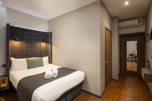 Habitación Doble sin ventana - Adaptada para personas de movilidad reducida del hotel Point A Hotel King Cross - St Pancras. Foto 1