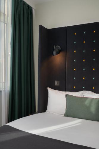 Habitación doble acogedora con ventana del hotel Point A Hotel King Cross - St Pancras. Foto 10