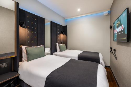 Habitación Doble Cosy sin ventana - 2 camas del hotel Point A Hotel King Cross - St Pancras. Foto 5
