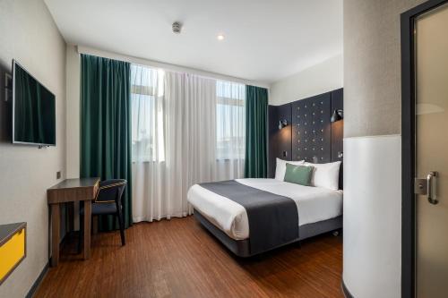 Habitación doble accesible con ventana del hotel Point A Hotel King Cross - St Pancras. Foto 6