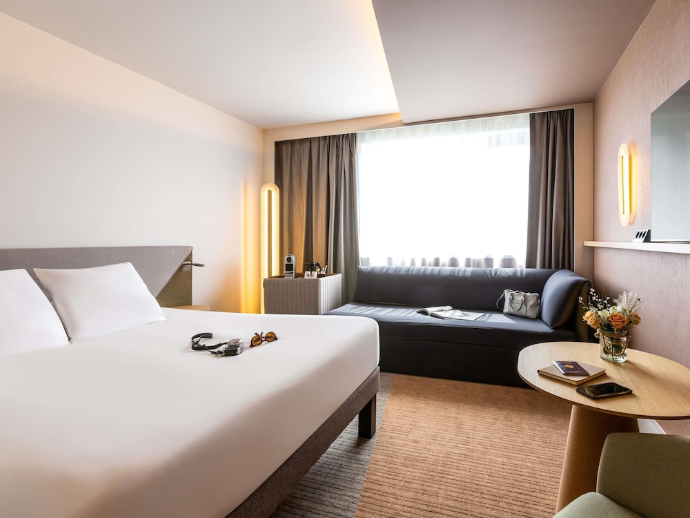 Habitación familiar, varias camas del hotel Novotel Nancy. Foto 5