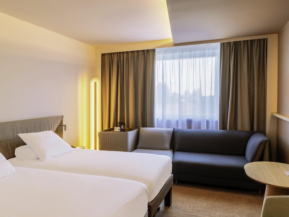 Habitación superior, 2 camas individuales del hotel Novotel Nancy. Foto 1