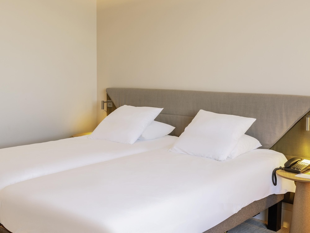 Habitación superior, 2 camas individuales del hotel Novotel Nancy. Foto 3