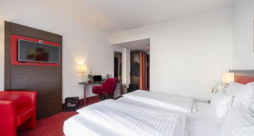 Habitación Doble Estándar - 2 camas del hotel PLAZA INN Amedia Vienna. Foto 5
