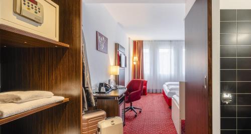Habitación Triple Confort del hotel PLAZA INN Amedia Vienna. Foto 1