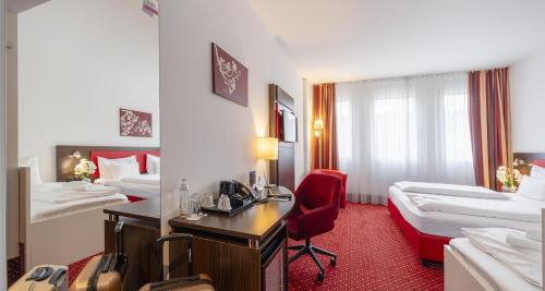 Habitación Triple Confort del hotel PLAZA INN Amedia Vienna. Foto 4