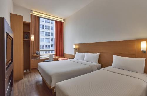 Standard Family Room with 1 Queen Bed & 1 Single Bed del hotel Ibis Singapore Novena. Foto 7