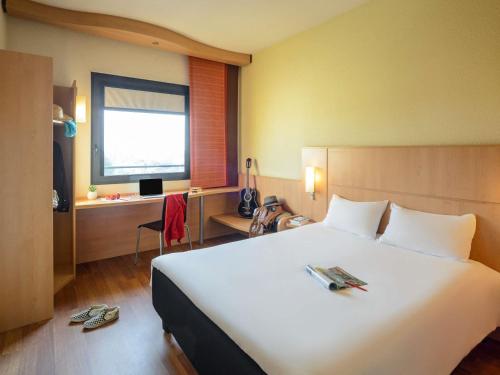 Habitación Estándar con 1 cama doble del hotel Ibis Milano Malpensa Aeroporto. Foto 4