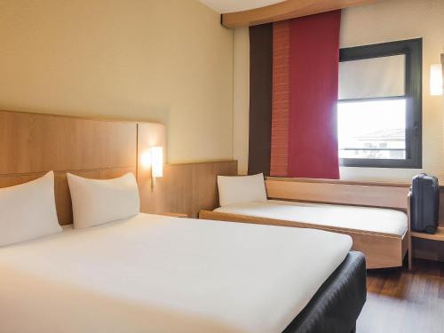Habitación Estándar - 1 cama doble y 1 individual del hotel Ibis Milano Malpensa Aeroporto