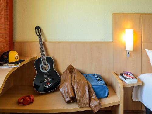 Habitación Estándar - 1 cama doble y 1 individual del hotel Ibis Milano Malpensa Aeroporto. Foto 4