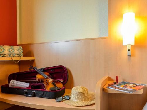 Habitación Estándar - 1 cama doble y 1 individual del hotel Ibis Milano Malpensa Aeroporto. Foto 5