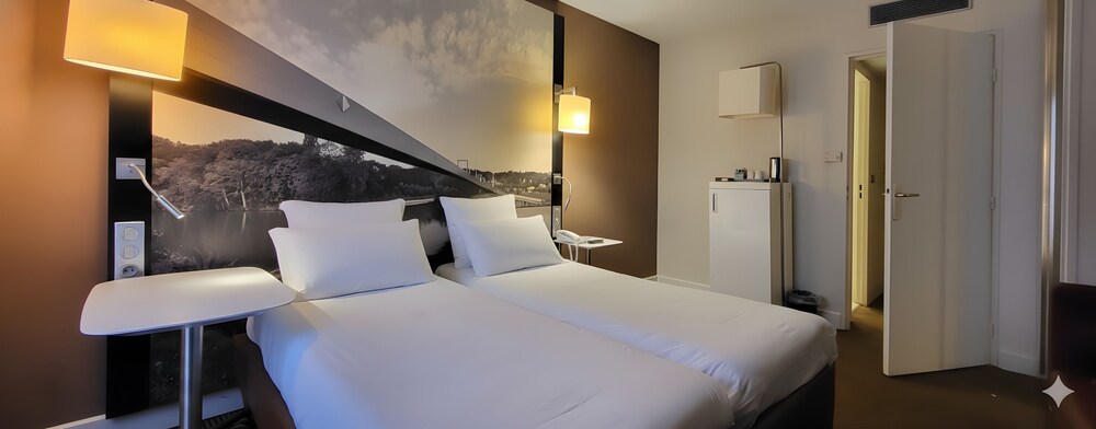 Habitación Clásica - 2 camas individuales del hotel Mercure Cergy Pontoise Centre. Foto 2