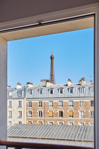 Habitación Doble Superior con vistas a la torre Eiffel - 2 camas del hotel Le Relais Saint Charles. Foto 4