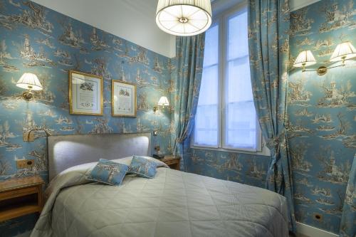Habitación Doble Clásica del hotel Grand Hotel De L'Univers Saint Germain. Foto 3