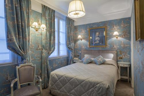 Habitación Doble Estándar del hotel Grand Hotel De L'Univers Saint Germain. Foto 12
