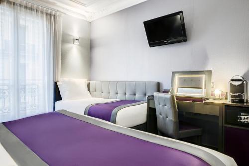 Habitación Doble Confort con cama supletoria - 1 o 2 camas del hotel Best Western Nouvel Orléans Montparnasse. Foto 3