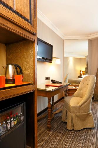 Habitación Superior del hotel Au Manoir Saint-germain. Foto 4