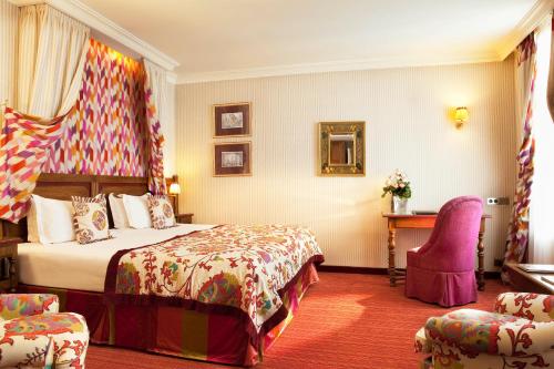 Habitación Deluxe del hotel Au Manoir Saint-germain. Foto 6