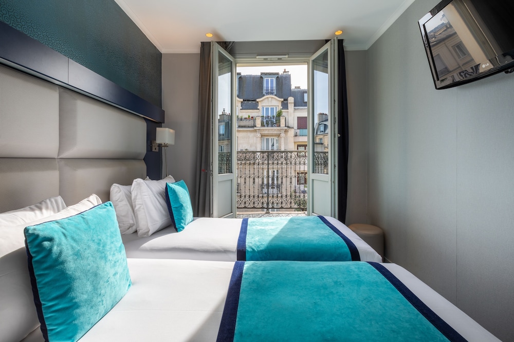 Habitación con 2 camas individuales del hotel Prince Albert Montmartre. Foto 12