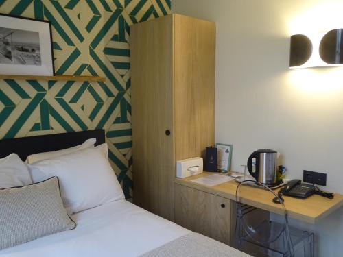 Habitación Individual del hotel De France Invalides. Foto 1