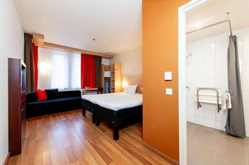 Habitación Doble Estándar 2 camas - adaptada para personas con movilidad reducida del hotel Ibis Krakow Stare Miasto. Foto 3