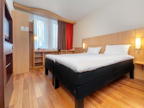 Habitación Doble - 2 camas del hotel Ibis Krakow Stare Miasto. Foto 1