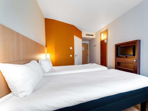 Habitación Doble - 2 camas del hotel Ibis Krakow Stare Miasto. Foto 5