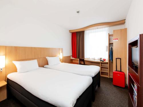 Habitación Doble - 2 camas del hotel Ibis Krakow Stare Miasto. Foto 9
