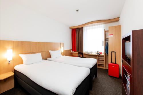 Habitación Doble - 2 camas del hotel Ibis Krakow Stare Miasto. Foto 11