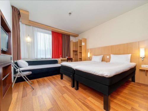 Habitación Doble Estándar 2 camas - adaptada para personas con movilidad reducida del hotel Ibis Krakow Stare Miasto