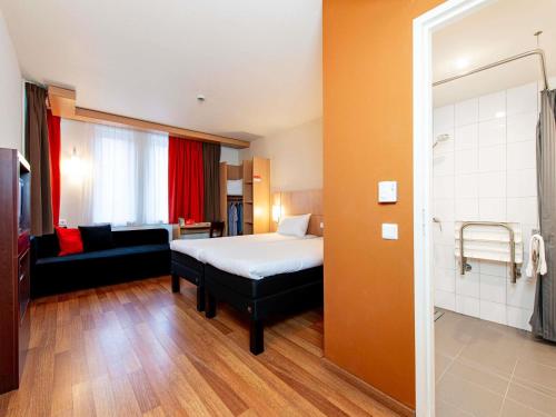 Habitación Doble Estándar 2 camas - adaptada para personas con movilidad reducida del hotel Ibis Krakow Stare Miasto. Foto 4