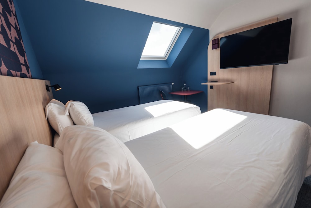 Habitación estándar con 2 camas individuales del hotel Ibis Styles Charleroi Airport Aero 44. Foto 3