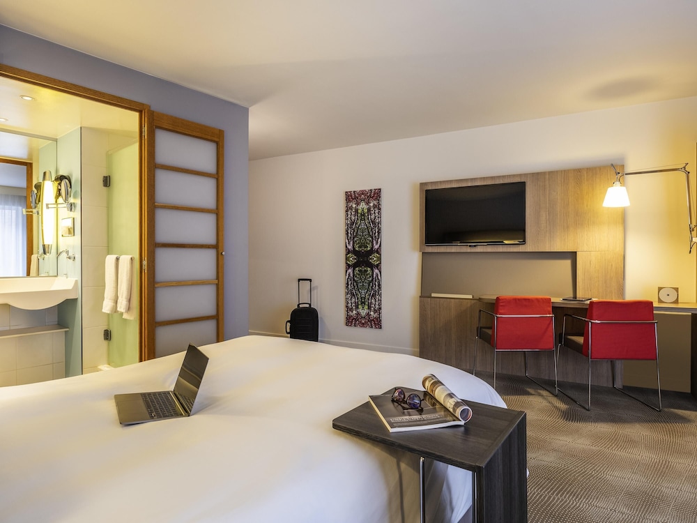 Habitacion Superior con 1 cama doble y Sofa del hotel Novotel Mechelen Centrum. Foto 6