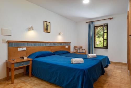 Habitación Doble Económica del hotel Hospedería Santuari de Lluc. Foto 3