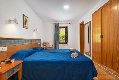 Habitación Doble Económica del hotel Hospedería Santuari de Lluc. Foto 6