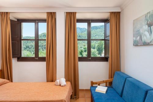 Estudio con Sofa Cama del hotel Hospedería Santuari de Lluc. Foto 3